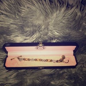 Gently worn collectorsJuicy Couture charm bracelet